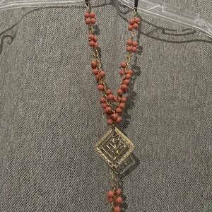 Gold-Tone Necklace with Coral Bead Clusters and Textured Pendant